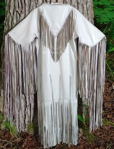 Handmade Womens white leather fringes beaded pawwow Regalia wedding Dress Item specifics Condition: New with tags: A brand-new, unused, unworn and undamaged item in the original packaging (such as the original box or bag) and/or with the original tags attached, Accents: Beaded, Fringe Dress Length: Long Department: Women Style: Long Dress, Maxi Material: Real Leather Theme: 70s, 80s, 90s, Western Color: White Sleeve Length: Long Sleeve Occasion: Powwow, Wedding Brand: MyNativeStore Woman's Western Leather with Fringes Wedding Dress 100 % Genuine Top Quality Soft Leather With Fringes Hair Tassels Powwow Wedding DressWomen Wedding DressFringes DressLeather Wed DressWhite Maxi DressHandmade DressLong Sleeve Dressbeaded fringes DressLong Dress MaxiHair Tassels DressSoft Leather maxiHair Tassel White Fringe Dress For Wedding, White Wedding Dresses With Tassels, White Fringe Wedding Dress, White Beaded Fringe Wedding Dress, Traditional White Dress With Tassels, Hair Tassels, Native Wedding, Fringe Wedding Dress, Beaded Fringe Dress