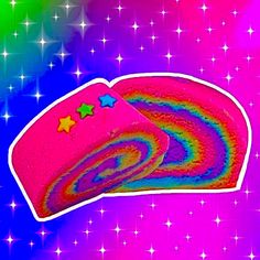 two pieces of pink and purple cake with stars on it, against a multicolored background