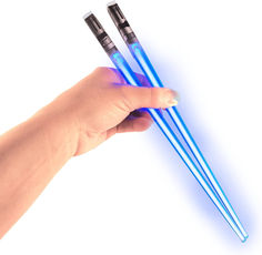 two blue lightsticks being held up by a person's hand on a white background