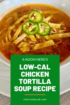 a bowl of low - cal chicken tortilla soup with green peppers and sliced jalapenos