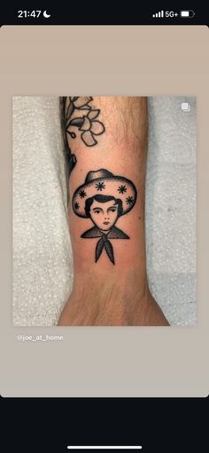 a person with a tattoo on their arm