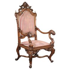 an ornate wooden chair with striped upholstered seat and arm rests against a white background