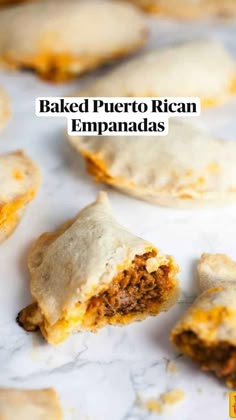 baked puerto rican empanadas on a marble countertop with text overlay