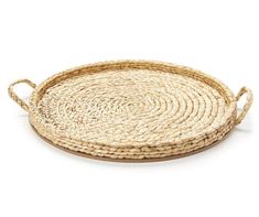 a round woven tray with handles on the side and an oval handle at the bottom