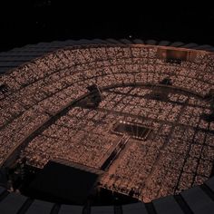 an aerial view of a stadium at night