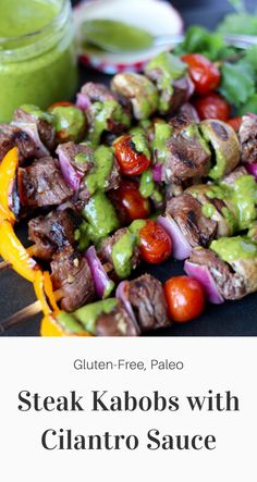 steak kabobs with cilantro sauce on skewers and green dressing