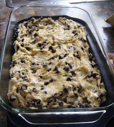 a baking pan filled with batter and chocolate chips