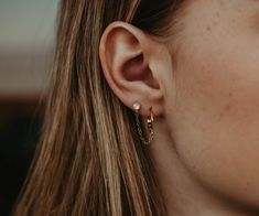 "These CZ stud with hoop are the perfect double piercing earring. Up your ear stack game with this gold hoop with a CZ stud that's connected with a chain. These huggies and studs are super easy to put on and are secure with leverbacks that you can trust. Double earrings are so on trend and you can wear 2 sets on each ear, or go a bit edgier with just one ear set. THE DETAILS: 🖤 12mm 14k Gold Filled or Sterling Silver Hoop 🖤 14k Gold Filled or Sterling Silver 1 Inch Chain 🖤 4mm Gold Sterling S Double Piercing Earring, Double Earring, Double Stud Earrings, Stack Game, Bridesmaid Gifts Earrings, Silver Wrapping Paper, Silver Butterfly Earrings, Double Earrings, Double Piercing