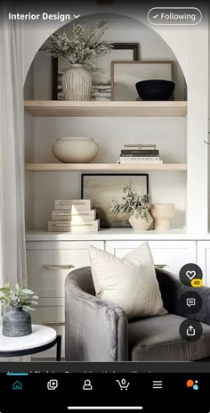 a living room filled with furniture and decor