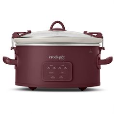 the crock pot is red and has two handles on each side, with an open lid