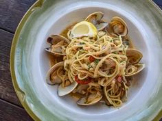 pasta with clams and sauce in a bowl