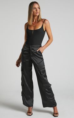 Saori Pants - Mid Rise Cargo Pants in Black | Showpo USA Black Cargo Pants Outfit Women, Low Rise Pants Outfit, Cargo Outfits Women, Cargo Trousers Outfit, Black Pants Work, Satin Pants Outfit, Black Cargo Pants Outfit, Satin Cargo Pants, Satin Outfit