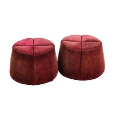 two red ottomans sitting next to each other