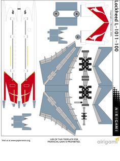 an airplane cut out from paper with red and white markings on the bottom, and two planes