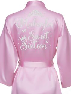 Elevate your Sweet 16 celebration with our exquisite Pink and Silver Robe, designed to make you feel like the star of the show! This stunning robe features a soft pink hue beautifully complemented by elegant silver accents, perfect for any glamorous occasion. Each robe is fully personalized, adding a unique touch that showcases your individuality. Whether for getting ready or as a stylish accessory during the festivities, this robe is a must-have for your special day! Includes : RobeAll the item Pink Fitted Long Sleeve Robe, Fitted Long Sleeve Pink Robe, Pink Fitted Robe For Wedding Night, Elegant Pink Wedding Robe, Pink Long Sleeve Wedding Robe, Pink Long Sleeve Satin Robe, Pink Satin Party Robe, Pink And Silver, Sweet Sixteen