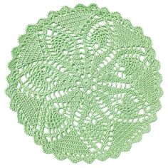 green crocheted doily on white background