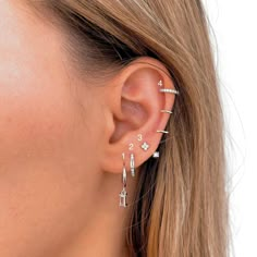 a woman with ear piercings on her ears