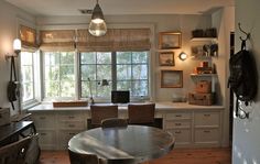 the kitchen is clean and ready to be used as a dining room or office area