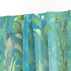 blue and green curtains with flowers on them