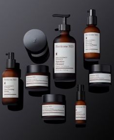 an assortment of skin care products displayed on a black background with the words perricone me