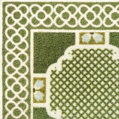 a cross stitch pattern with green and white designs