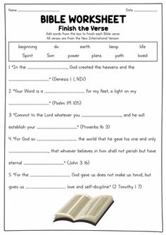 a bible worksheet with the words, and an open book on top of it