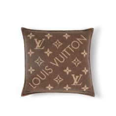 the louis vuitton pillow is made from brown fabric and features stars on it