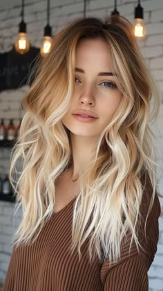 30 Bold Hair Color Trends to Embrace Fall Blonde Ombre Balayage, Dark Blonde Balayage Long Hair, Dark Blonde Red Hair, Red Roots Blonde Hair Balayage, Brown To Platinum Balayage, Bold Money Piece Hair Blonde, Fall 2024 Blonde Hair Trends, Blonde Balayage With Bangs, Money Piece Hair With Bangs