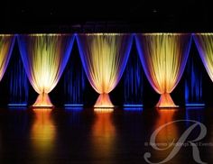 an image of a stage setting with curtains