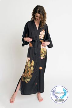 "This beautiful, mid-weight kimono makes your life easy -- it's easy to clean and easy to wear. As a kimono cover up to lounge in at home, it's luxurious. As a statement piece to make your outfit pop, it's dynamic. And since it's easy to clean, it makes laundering a cinch. With the soft, gentle material, luxurious drape, and sophisticated floral design, this kimono cover up is a gorgeous choice for an elevated day. INTRICATE DETAILS: Our women's kimono robes have removable waist-tie closures wit Satin Kimono With Floral Print, Floral Print Satin Kimono, Spring Wedding Satin Kimono, Look Kimono, Asian Vintage, Short Kimono Robe, Traditional Women, Bohemian Beauty, Kimono Floral