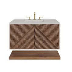 a bathroom vanity with a marble top and wooden base, on a white wall background