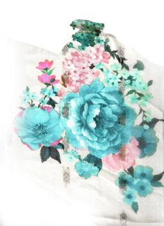 a white shirt with blue and pink flowers on it