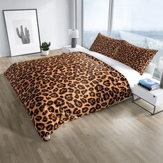 a leopard print comforter set in a bedroom