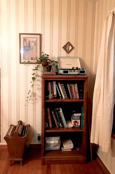 a bookshelf with many books on top of it