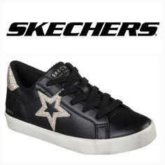 🔥 Skechers Street Los Angeles Diamond Stars Starry Steps Leather Sneakers, Size & Color: 9/Black/Gold ✨️Brand New with Box✨️ Street Style, Trendy✨️ Take the lead role in your story wearing the SKECHERS Street Diamond Starz shoe. Smooth leather and synthetic upper in a lace-up fashion sneaker with glitter finish star deisgn on side and glitter overlays. PRODUCT FEATURES: Smooth clean leather upper Leather, synthetic, and glitter finish synthetic overlays Lace-up fashion sneaker design. Stitching accents Contrast colored glitter finish star overlay on side panel. Star design with stitched edging and lace-through top effect. Matching color glitter finish heel panel overlay Lace up front Padded collar and tongue Soft fabric shoe lining Wedge Fit cushioned comfort insole adds 1 inch hidden wed Star Overlays, Glitter Overlays, Sneaker Design, Lead Role, Fabric Shoes, Diamond Star, Star Design, Gold Branding, Designer Sneakers