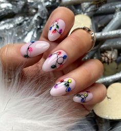 Pale white nail color with Christmas lights nail design on medium almond nails Light Nails, Christmas Nails Acrylic, Winter Nail Designs, Cute Nail Art, Christmas Nail Designs