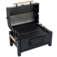 an open black grill with two drawers on it