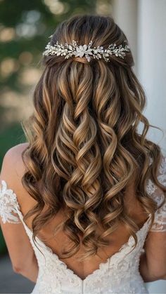 the back of a woman's head wearing a bridal hair comb