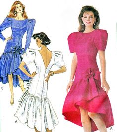 a women's dress with ruffles and bow at the waist, asymmetric