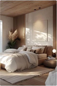 a large bed sitting next to a window in a room with white walls and wooden floors