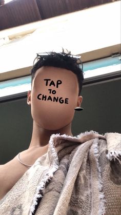 a man with the words tap to change written on his face and under his shirt