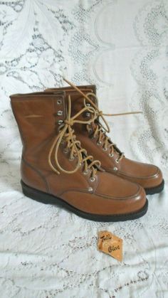 Vintage Workboots New No name on the them But Made in Czechoslovakia Full Grain Glove Leather Insulated 6 sets of Eyelets and 3 Hooks 9" tall Rawhide Laces The size is a 9 EE, but Please go by measurements 11 3/4" heel to toe bottom sole 4" across the widest part of bottom sole Excellent Vintage Condition. New, but there may be a couple of storage dings Vintage items are Unique and Often one of a Kind. No fear of seeing a carbon copy of what you're wearing on someone else. With That in Mind, bid Casual Hunting Boots With Reinforced Toe, Vintage Brown Moto Boots With Plain Toe, Vintage Boots With Goodyear Welt Construction, Vintage Boots With Goodyear Welt Construction Plain Toe, Vintage Boots With Goodyear Welt Construction And Plain Toe, Vintage Brown Moto Boots With Goodyear Welt Construction, Vintage Brown Moto Boots With Goodyear Welt, Brown Vintage Moto Boots With Goodyear Welt, Vintage Combat Boots With Steel Toe For Outdoor