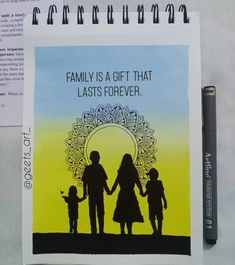 a family is a gift that lasts forever on a notepad next to a pen