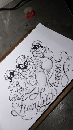 a drawing of a cartoon character with the word family on it's face and two clowns