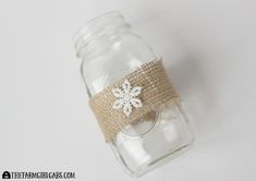 a mason jar with burlock and snowflake on it