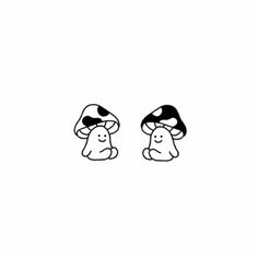 two mushrooms sitting next to each other on top of a white surface with black ink