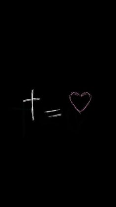 two crosses and a heart on a black background with the word love written in it