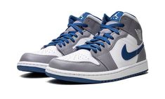 The Air Jordan 1 Mid “Cement Grey/True Blue” is a neutral colorway of the popular lifestyle shoe that was released in 2022.  Appearing in “Cement Grey/True Blue,” the Jordan 1 Mid is complete with a white leather base with contrasting Cement Grey leather overlay panels.  A True Blue leather Swoosh is located on either side of the shoe and a white “Wings” logo is found on the collar.  Jumpman and “Air” detailing appears on the blue nylon tongue tag.  A white rubber midsole and blue outsole complete the look. Shoes Wishlist, Jordans 1, Air Jordan 1 Mid Gs, Sneakers Box, Kobe Shoes, Blue Jordans, Nike Air Jordan 1 Mid, Shoes Retro, Jordan 1s