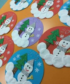 snowmen and trees made out of paper plates