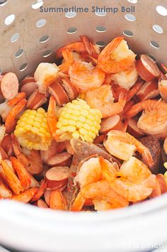 shrimp and corn are mixed together in the slow cooker for this summertime shrimp boil